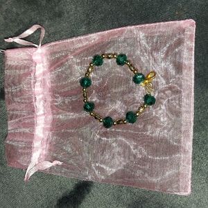 Emerald green and gold baby bracelet